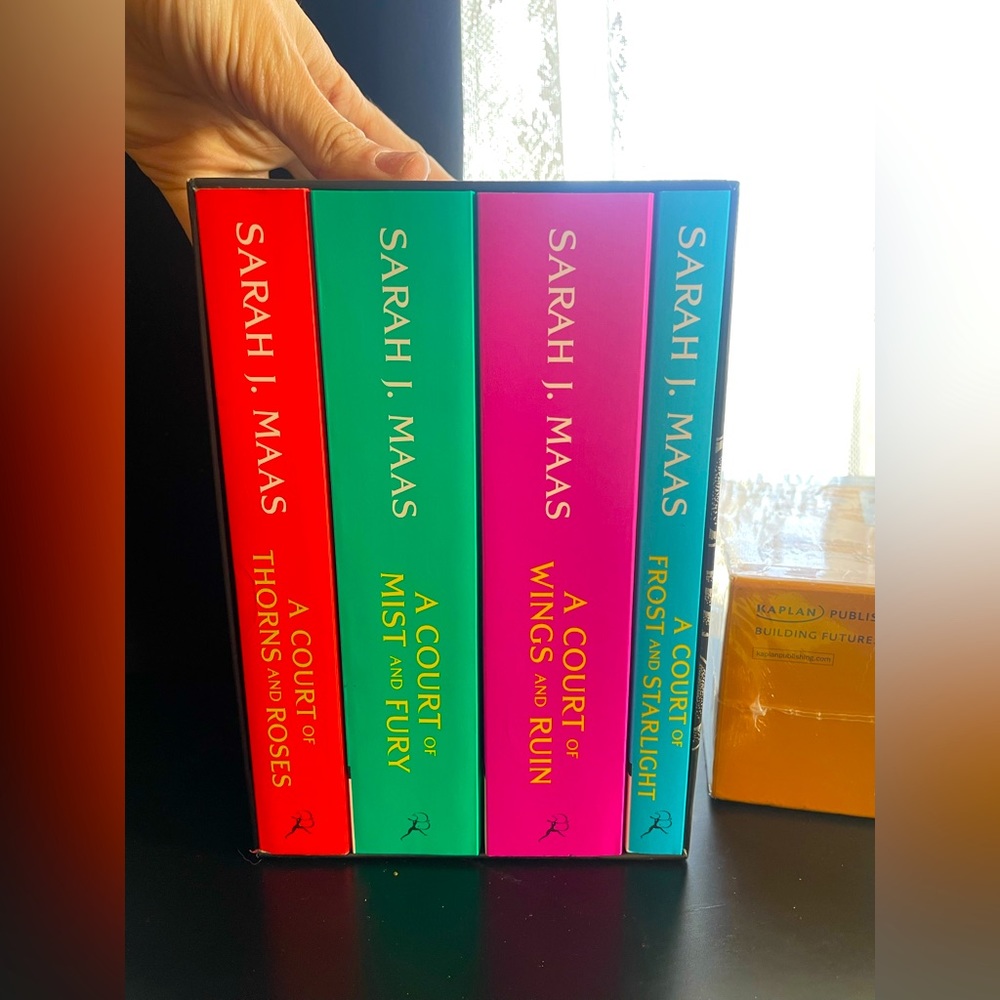 A Court of Thorns and Roses 4 Book Soft Cover Set NEW only read part of  book 1.